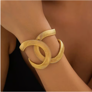 Jewels Galaxy Intertwined Bangle Style Cuff Bracelet (Golden)